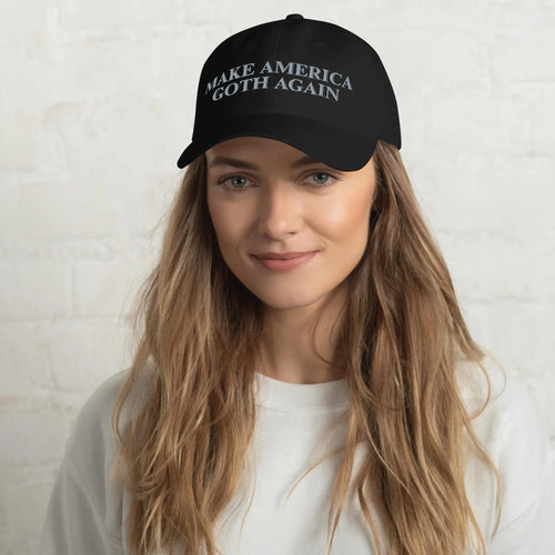 Make America Goth Again hat featuring embroidered gothic parody slogan. Funny unisex dad cap with adjustable strap and curved visor, perfect for goth fashion, alternative streetwear, concerts, festivals, Halloween, and spooky season outfits. Durable embroidery for a bold dark humor accessory and unique gothic gift idea.